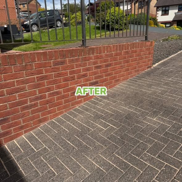 Brick wall and driveway edge after cleaning with a brighter finish